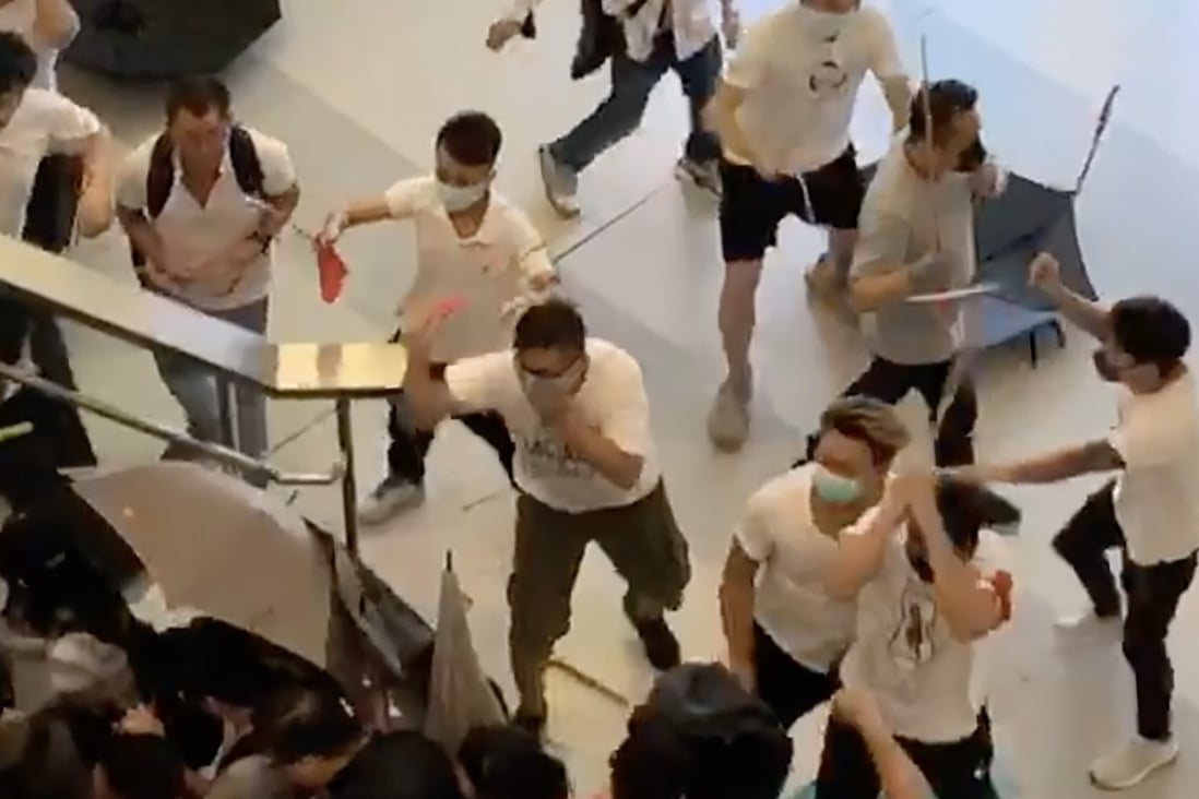 Men in white brandishing sticks and metal rods had attacked commuters at Yuen Long MTR station on Sunday. Photo: Handout