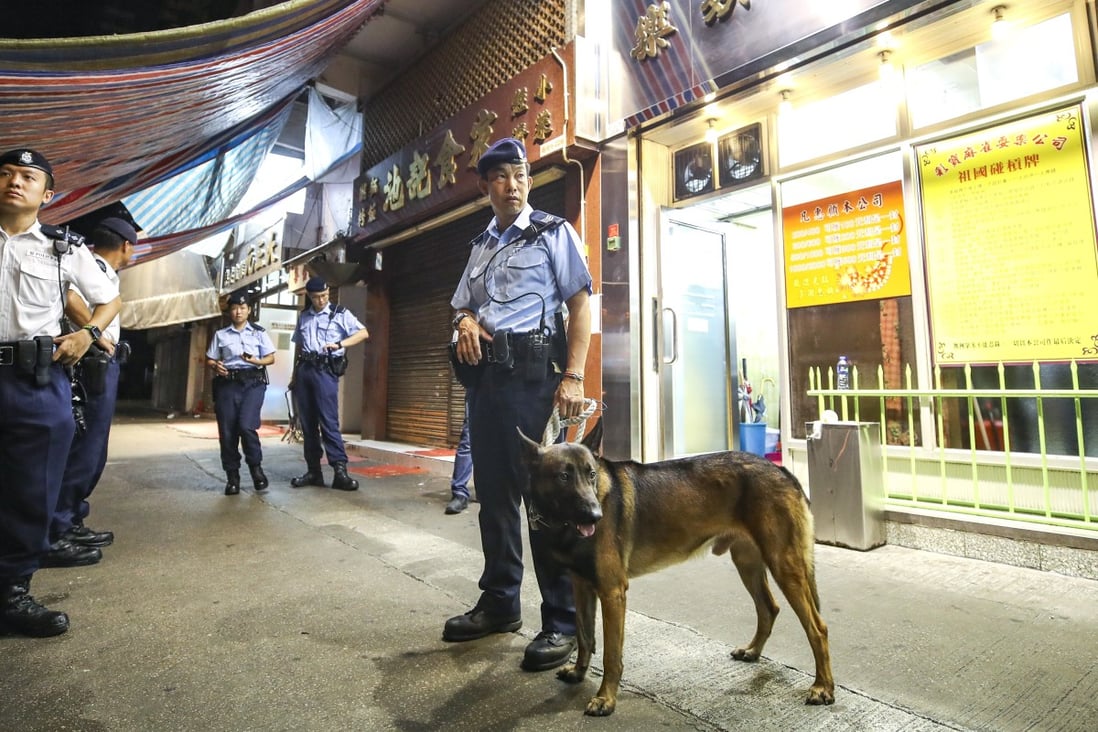 Police patrol the area after Sunday’s attacks in Yuen Long. Photo: Winson Wong