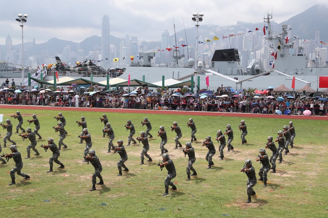 PLA soldiers show their skills during a naval base open day in Hong Kong. The PLA has had a presence in Hong Kong since the city’s return to Chinese sovereignty. Photo: K.Y. Cheng
