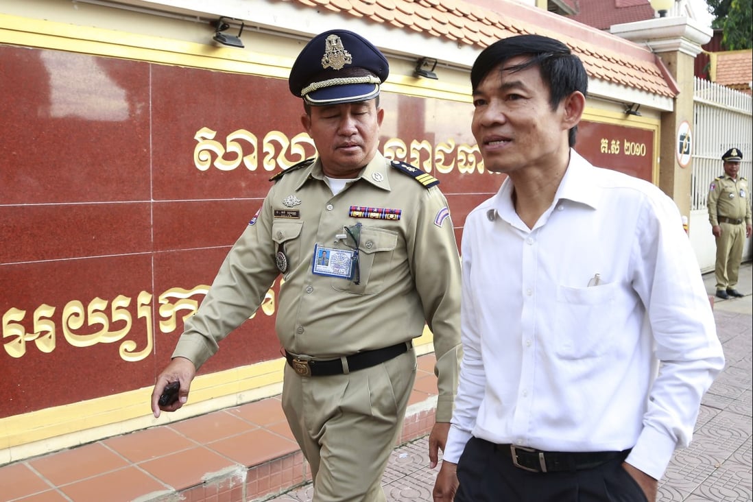 Former Radio Free Asia reporter Uon Chhin arrives at the Phnom Penh Municipal Court. Photo: AP