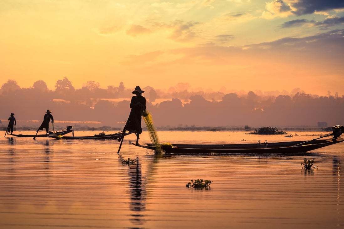 Fishermen on Inle Lake, Myanmar. Its water quality has suffered and a native of the lake, Yin Myo Su, has launched a series of initiatives to give it a sustainable future, including an aquarium where the lake’s endemic fish species are bred. Photo: Alamy