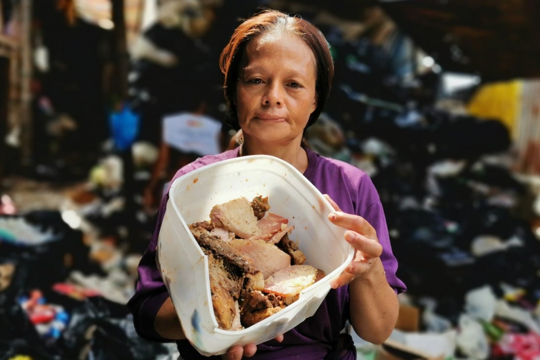 Myrna Salazar collects pagpag at Joe’s Junk Shop in Payatas. Photo: SCMP Pictures