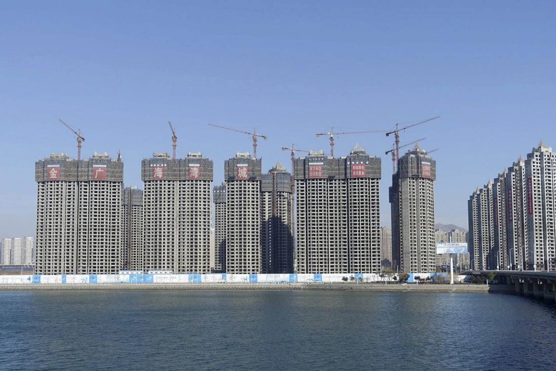 Residential buildings seen coming up in Dalian, Liaoning province, in November 2015. China on Tuesday ruled out easing property curbs to stimulate the economy. Photo: Reuters/China Daily