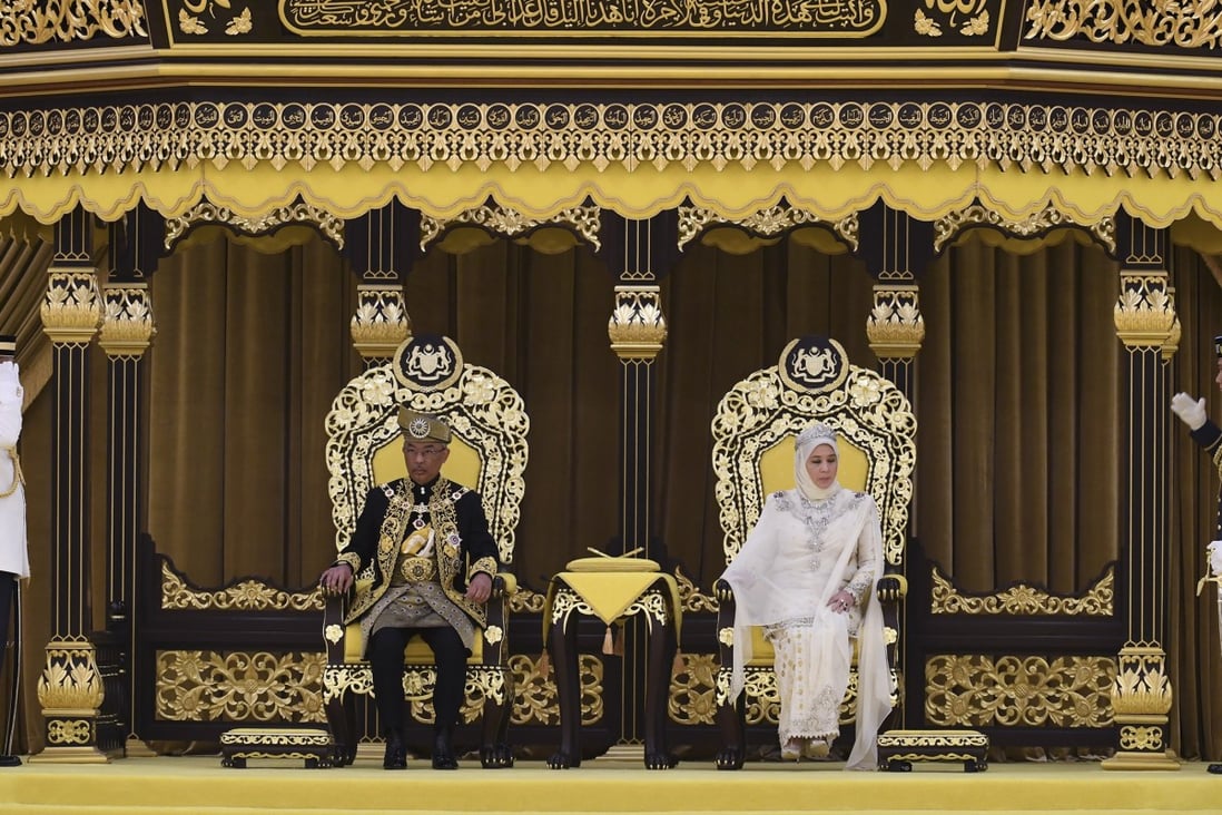 Sultan Abdullah with Queen Tunku Azizah Aminah at Tuesday’s installation ceremony. Photo: AP