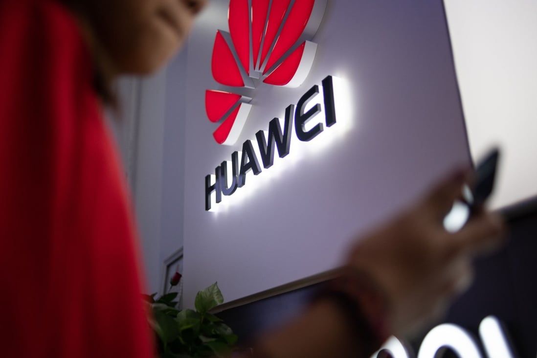A Huawei logo is displayed at a retail store in Beijing, 2019. Photo: AFP
