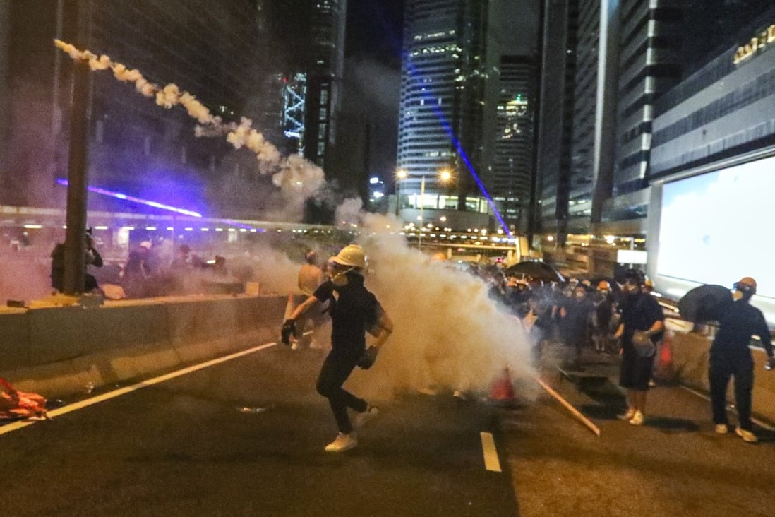 Tear gas was fired during clashes in Sheung Wan on Sunday night. Photo: Felix Wong