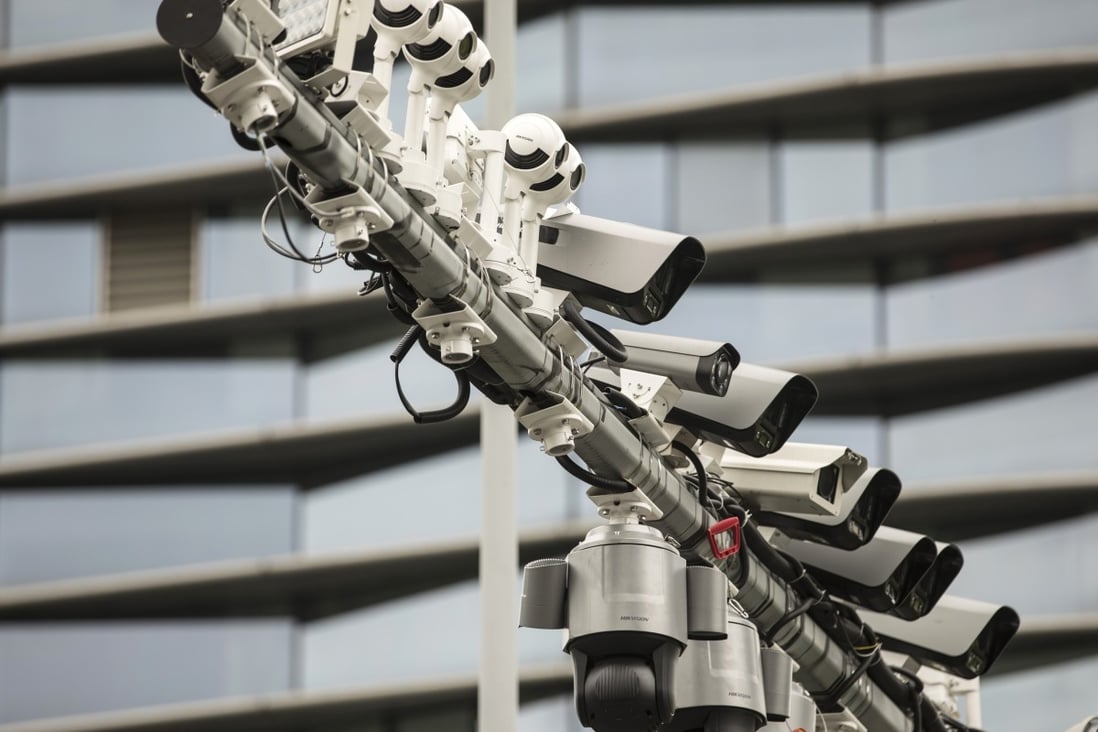 Surveillance cameras manufactured by Hangzhou Hikvision Digital Technology Co. are mounted on a post at a testing station near the company's headquarters in Hangzhou, China, on Tuesday, May 28, 2019. Photo: Bloomberg
