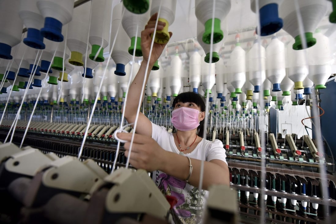 The Caixin/Markit manufacturing purchasing managers’ Index (PMI), a gauge of sentiment among the country’s factory operators which tends to include more small private sector firms, improved from 49.4 in June to 49.9 in July. Photo: AFP