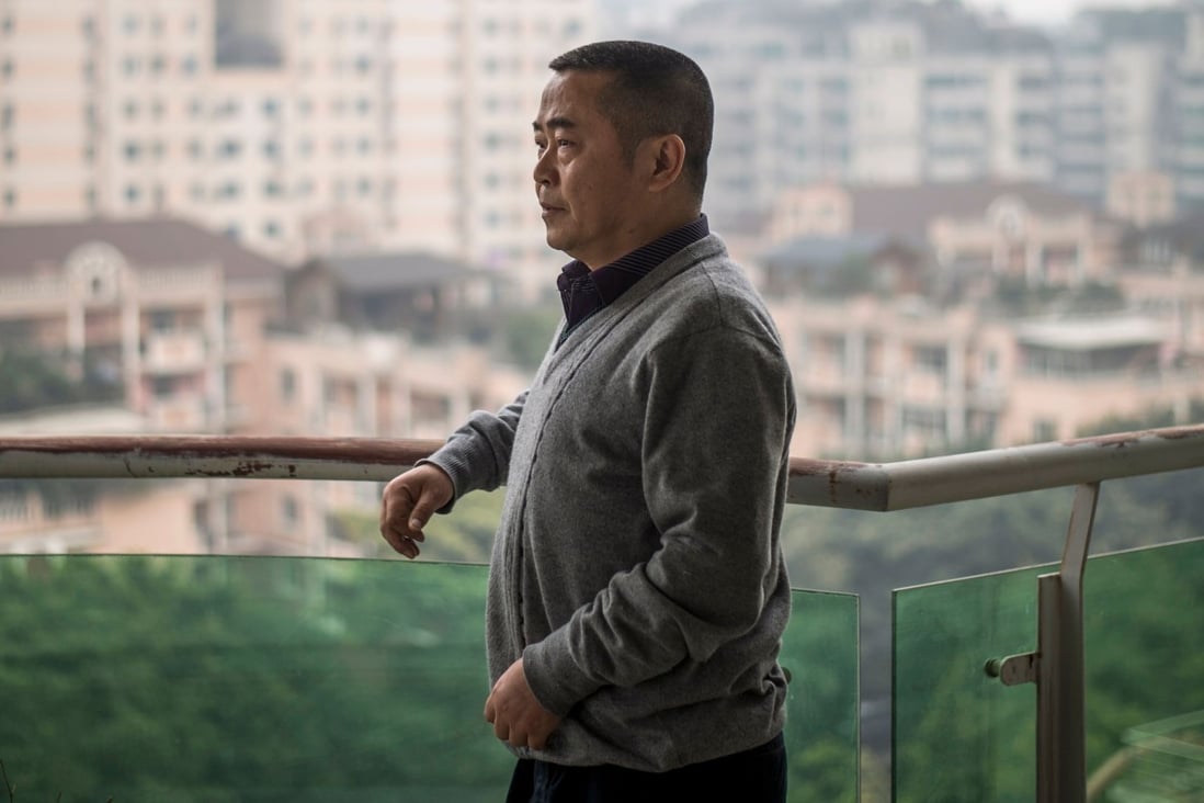 The activist Huang Qi at his home in Chengdu, Sichuan province, in 2015. This week he was sentenced to 12 years in jail, his third prison term. Photo: AFP