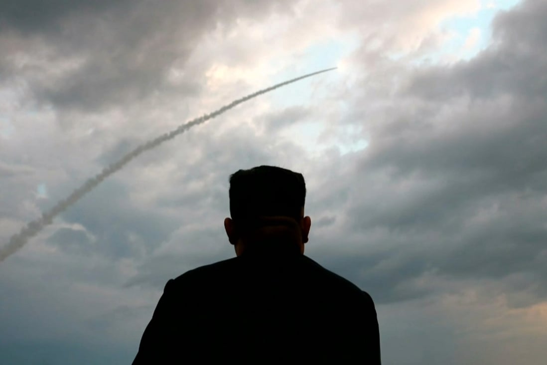 North Korean leader Kim Jong-un watches the launch of a ballistic missile on Wednesday. Photo: AFP/KCTV
