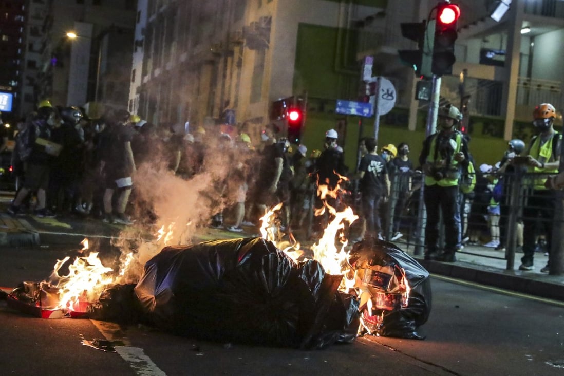Protesters set fires in Mong Kok on Saturday. Photo: Edmond So