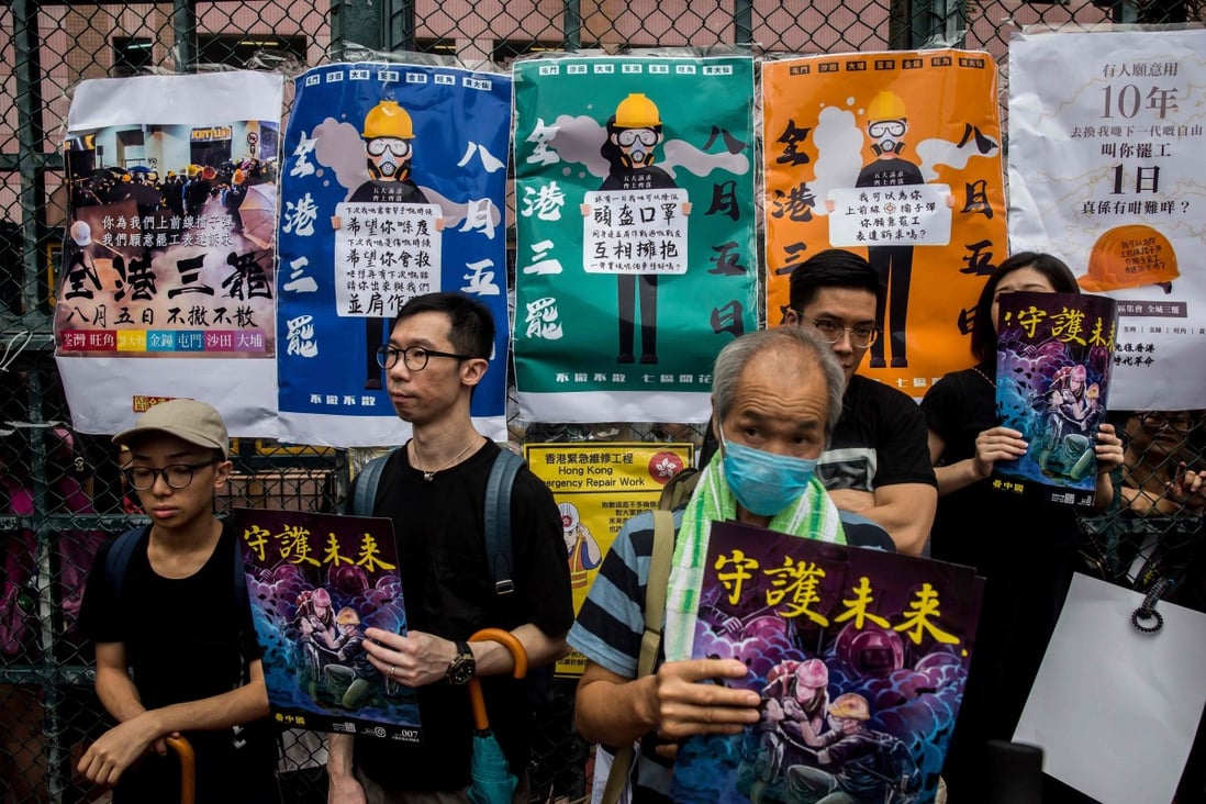 Protesters at a rally against the government in Mong Kok on Saturday. With workers from various sectors expected to join the strike, Hong Kong could see large-scale disruptions on Monday. Photo: AFP