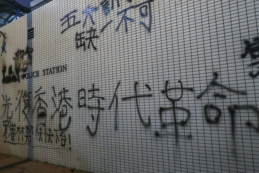 ‘Liberate Hong Kong; revolution of our times’ spray-painted on a wall at Western Police Station. Photo: Edmond So