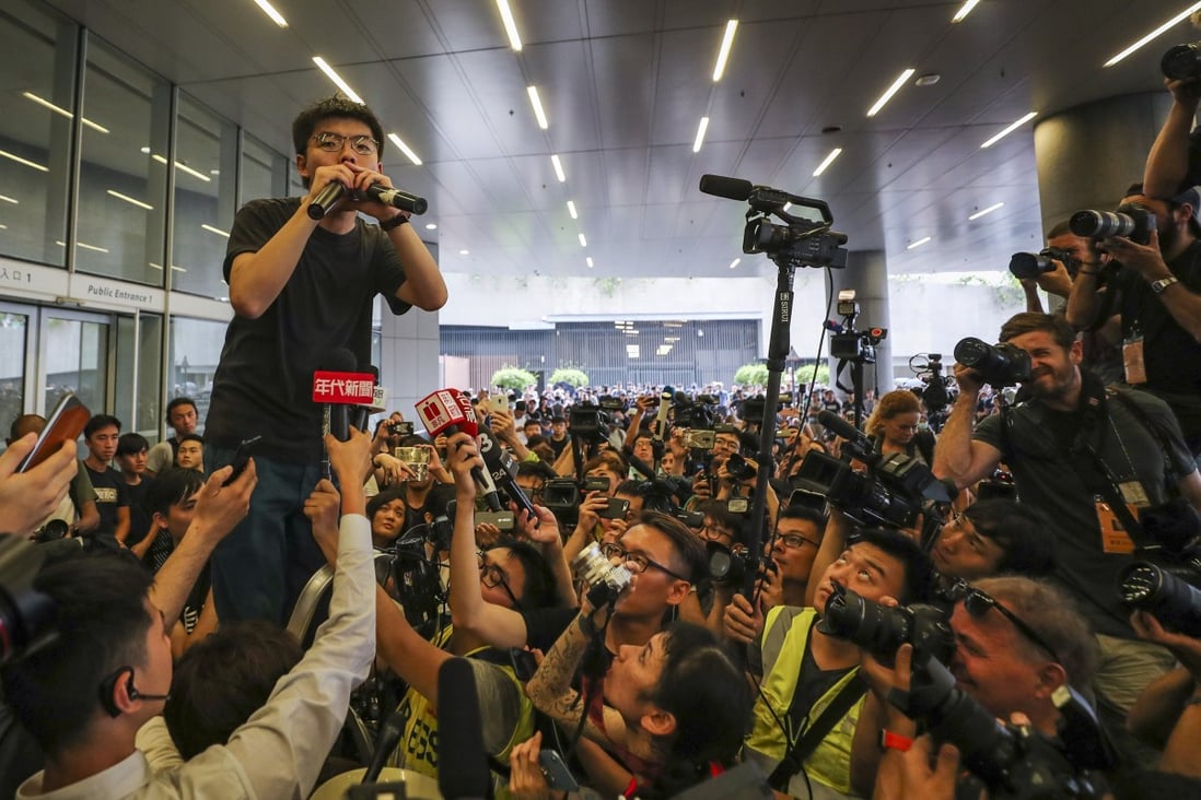 Joshua Wong is the centre of attention as he speaks to protesters against extradition law changes in Hong Kong a day after his release from prison. Photo: Sam Tsang