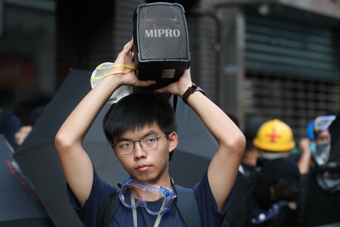 Pro-democracy activist Joshua Wong attends a rally against police brutality in Hong Kong on July 28. Photo: EPA-EFE