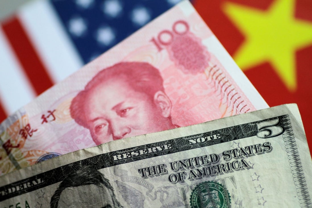 US dollar and Chinese yuan notes are seen in this picture illustration from June 2017. Photo: Reuters