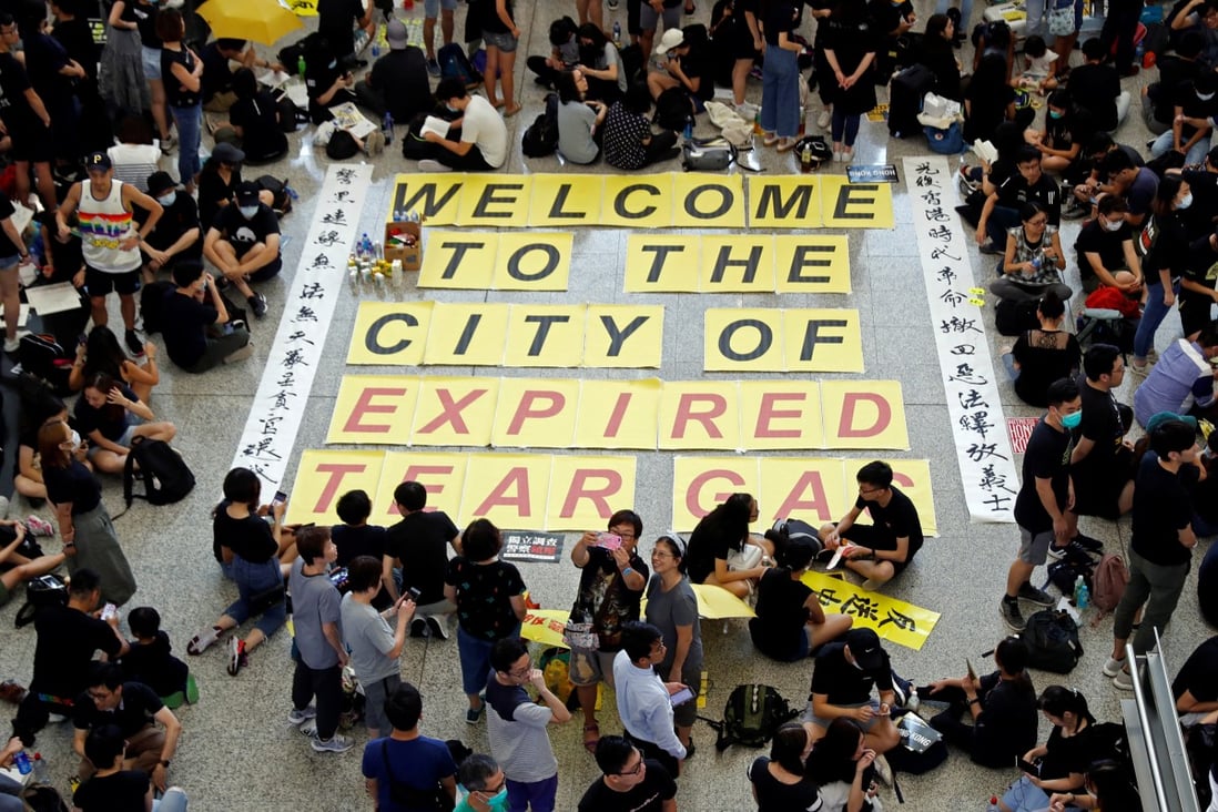 Demonstrators stage sit-in at the arrival hall of Hong Kong airport. Photo: Reuters