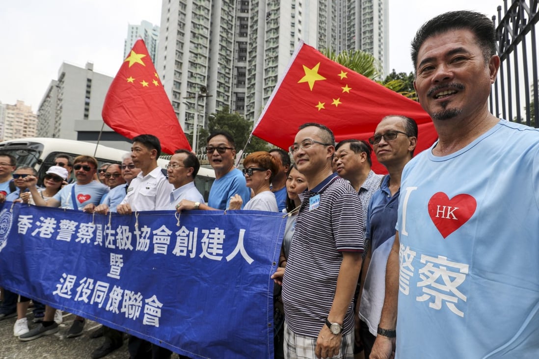 Supporters rally at Kwai Chung Police Station in support of the Hong Kong Police Force on Saturday. Photo: Edward Wong
