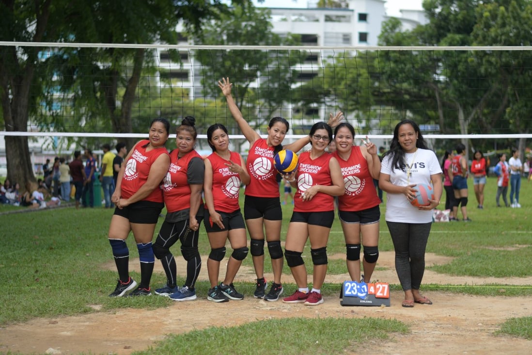Some Singapore-based foreign domestic workers play volleyball to keep fit. Photo: Clifford Lee