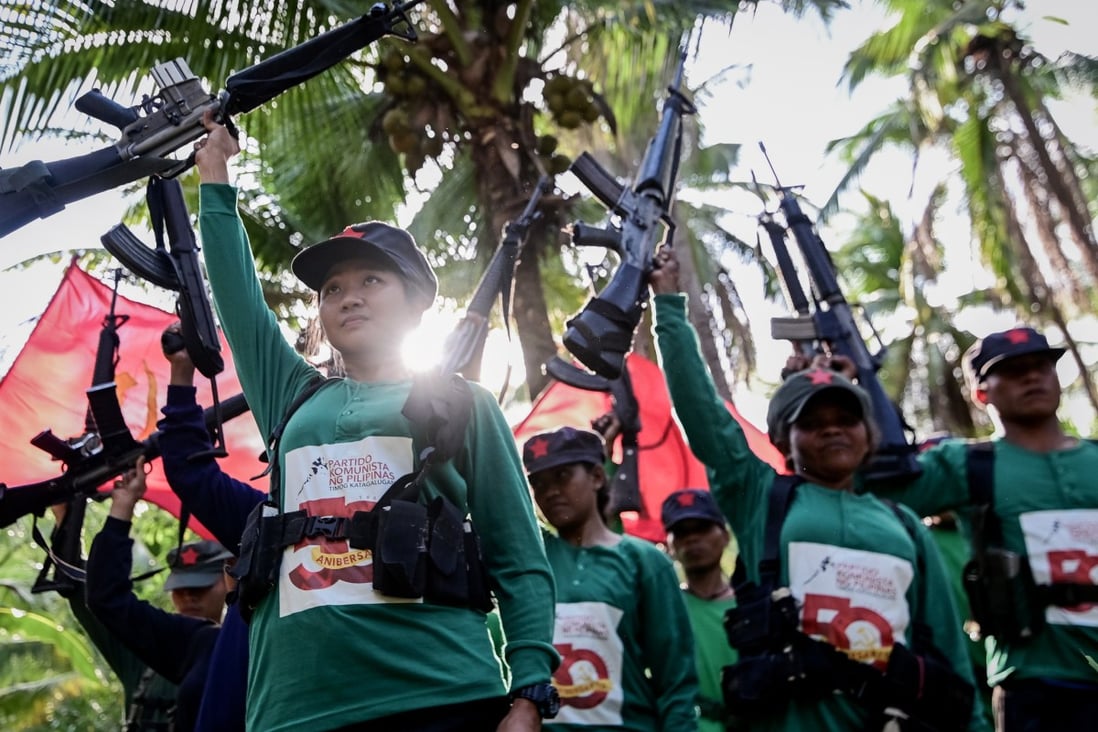 Fighters for the communist New People’s Army in the mountains of Sierra Madre in the Philippines. Photo: EPA