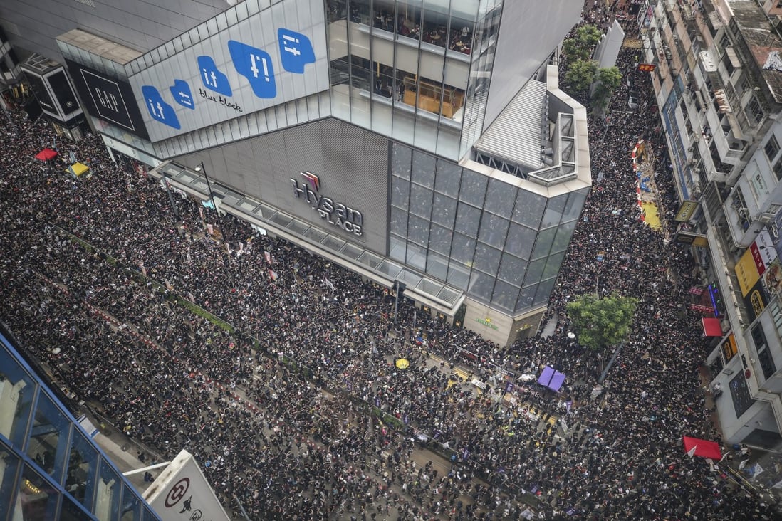 Anti-extradition bill protesters flood Causeway Bay on June 16, 2019. The frequent protests in the area over the past two months has affected the sales of shopping centre operators like Hysan Development. Photo: Winson Wong