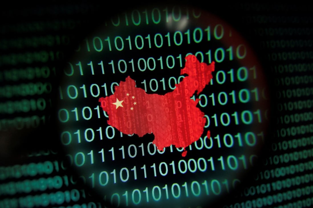A map of China is seen through a magnifying glass on a computer screen showing binary digits. Photo: Reuters