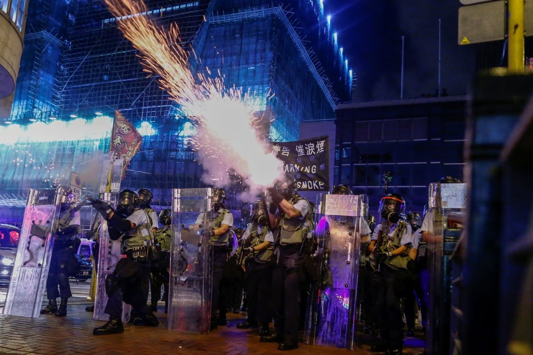 Police fire tear gas at anti-extradition bill protesters during clashes in Sham Shui Po in Hong Kong on August 14, 2019. Photo: Reuters