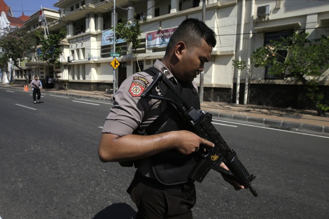 A police officer in Surabaya, East Java. File photo: AP