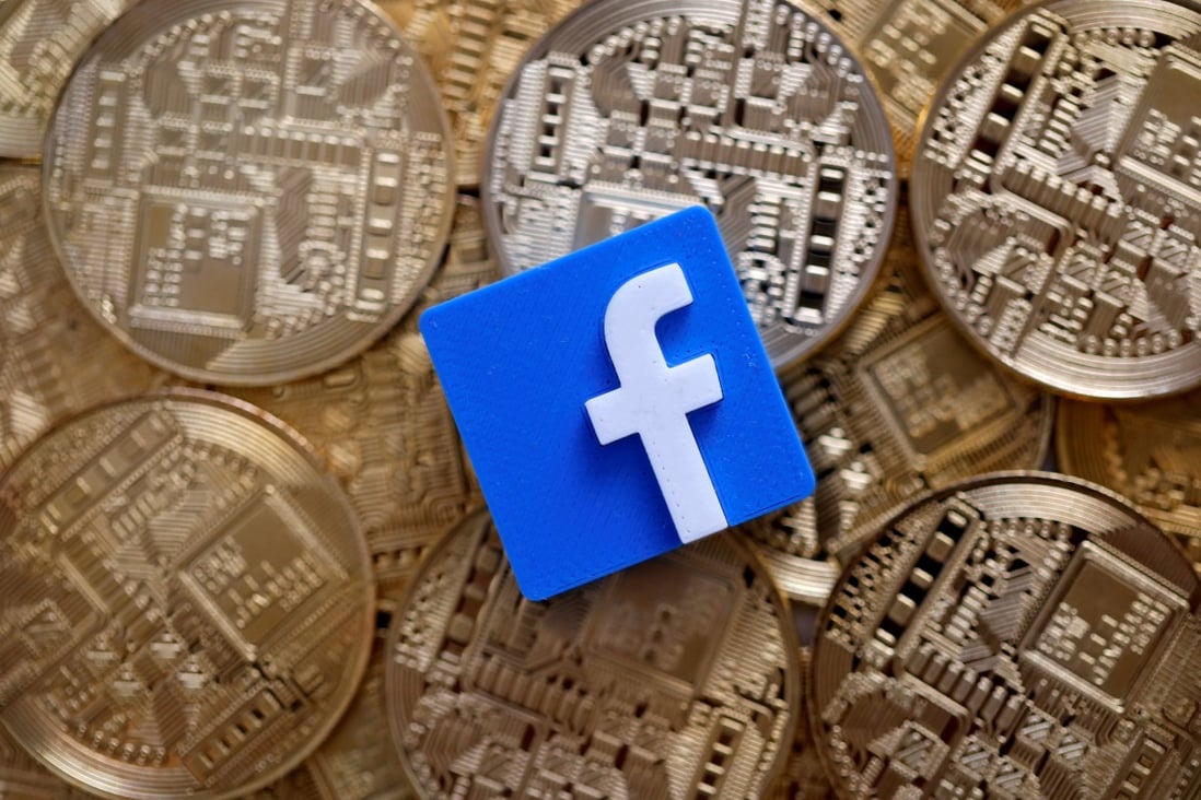 A 3-D printed Facebook logo is seen on representations of the Bitcoin virtual currency in this illustration picture, June 18, 2019. Photo: Reuters