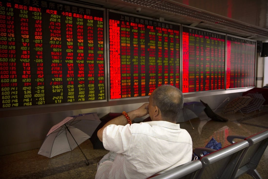 An investor monitors stock prices at a brokerage house in Beijing on August 20, when Asian shares edged higher after Wall Street rallied on the US decision to give Chinese telecoms giant Huawei another 90 days to buy equipment from American suppliers. Photo: AP