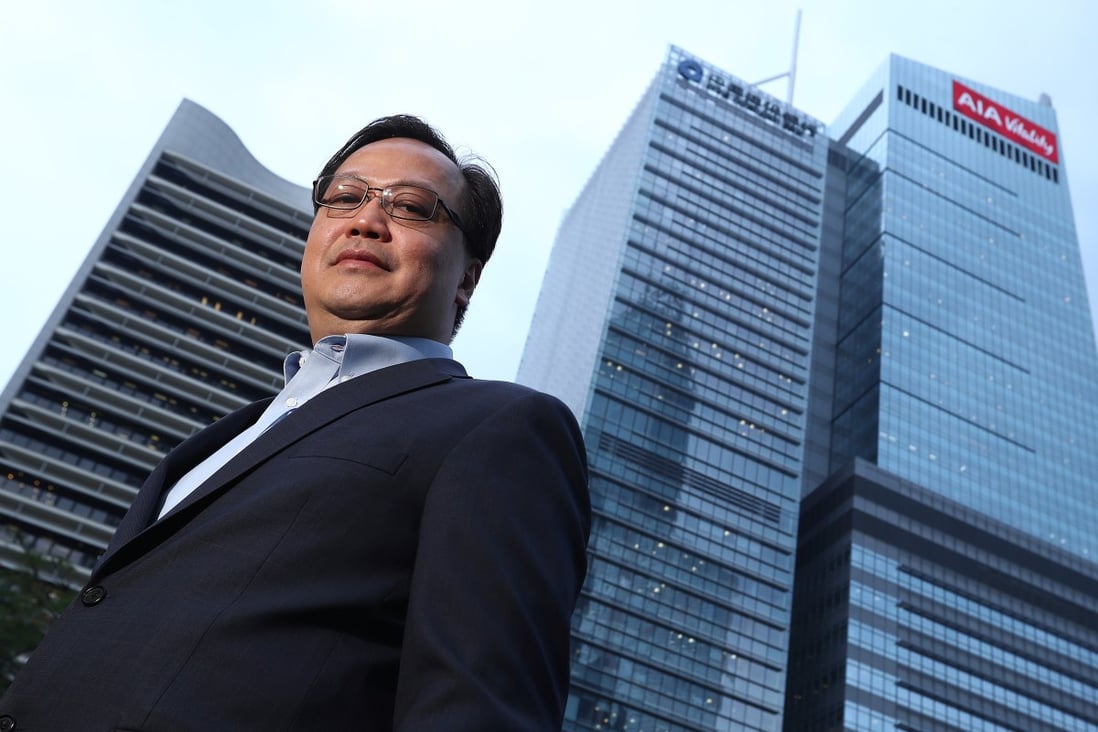 RRJ Capital chairman Richard Ong in front of CCB Tower in Central. Photo: Nora Tam