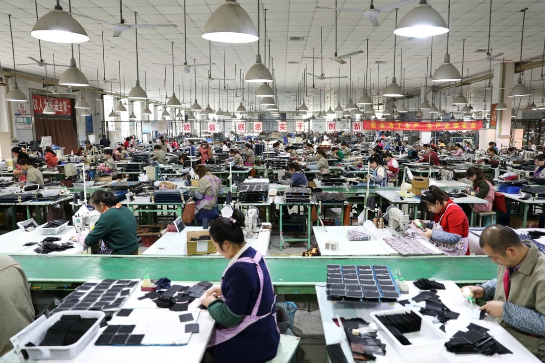 Employees work on the production line of a factory manufacturing fashion accessories in Sihong county, Jiangsu province, China March 27, 2019. Photo: Reuters