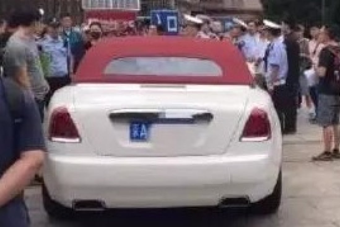 The rare licence plate on this luxury car blocking a hospital emergency access led to a police investigation and criminal detention for the owner and her former driver. Photo: Weibo