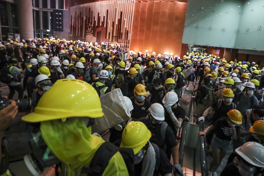 Protesters storm the Legislative Council on the 22nd anniversary of Hong Kong’s handover from Britain to China. Photo: Sam Tsang