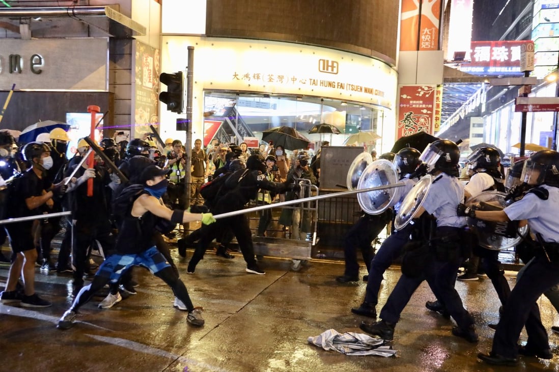 Protesters clash with police in Tsuen Wan. The volatile demonstrations in Hong Kong have damaged confidence in the city’s financial markets. Photo: Xinhua