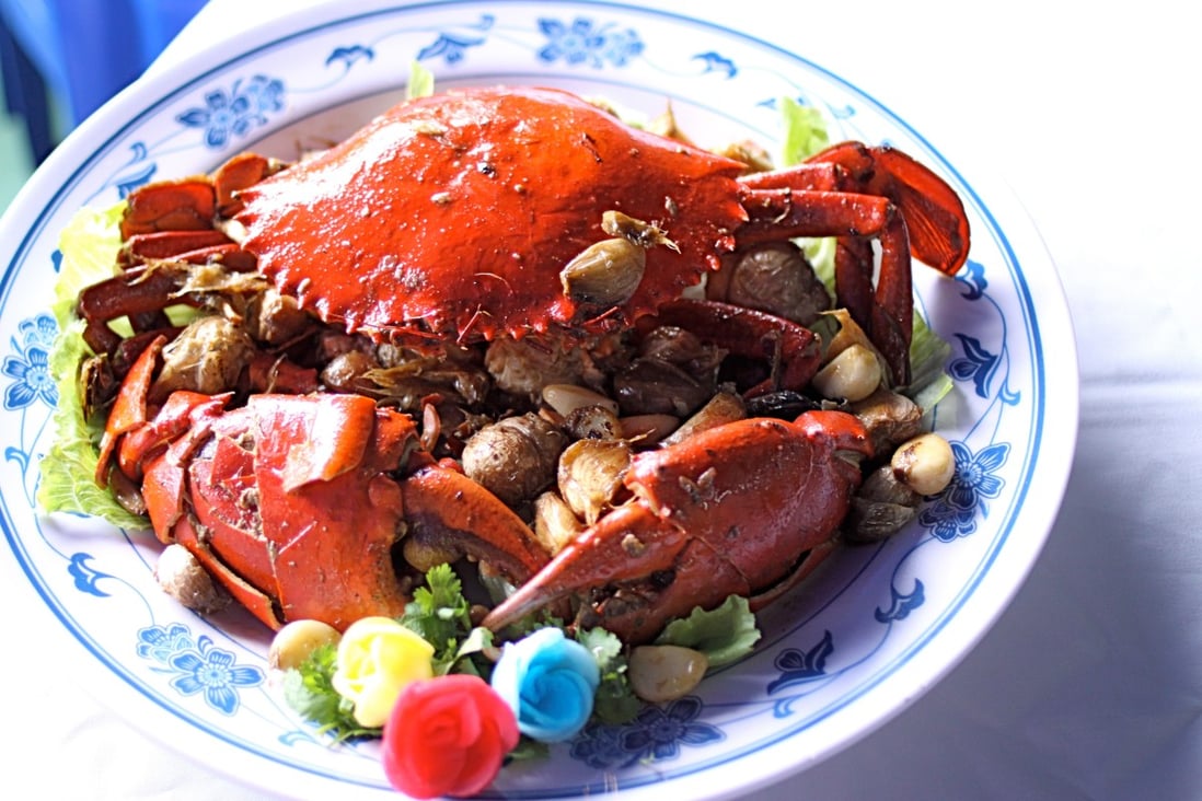 Garlic baked crab at New Ubin Seafood restaurant is just one traditional Singaporean dish that is still popular today.