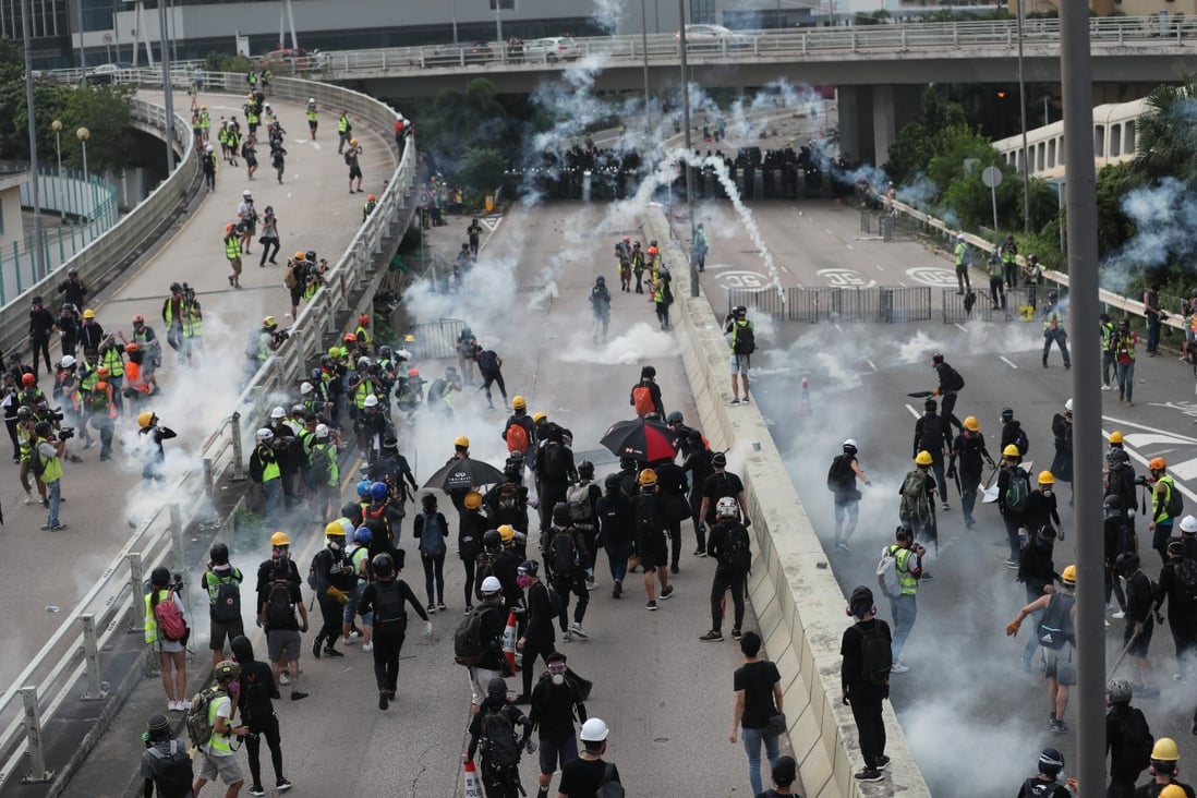 Riot police fire rounds of tear gas towards anti-government protesters in Kwun Tong, Hong Kong on August 24. Photo: Sam Tsang