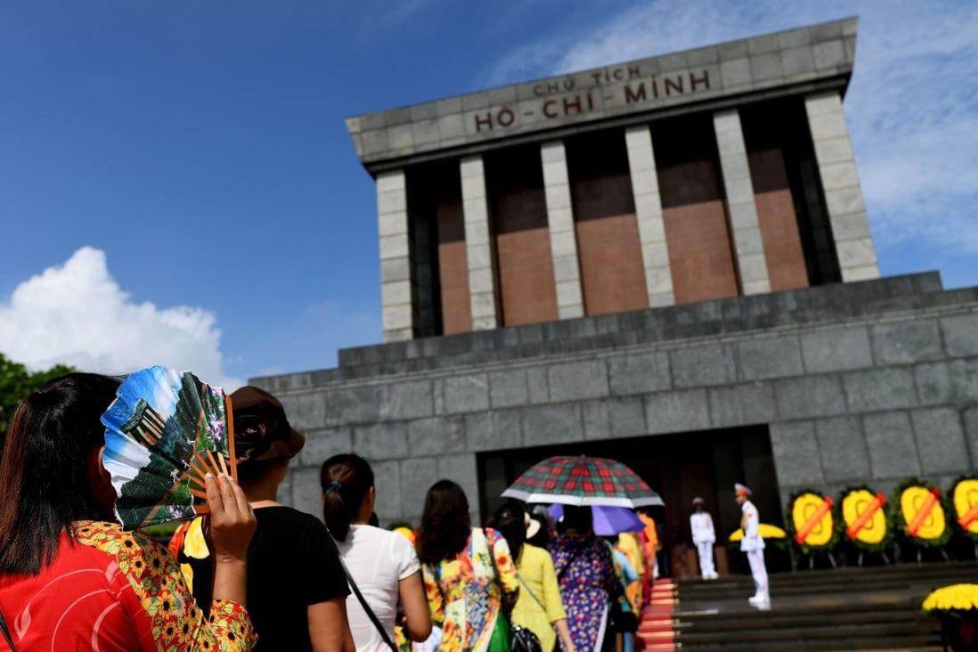 Tourists lining up to visit the Ho Chi Minh mausoleum in Hanoi. Photo: AFP