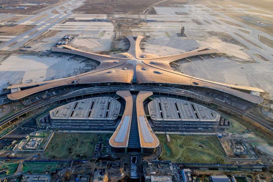Beijing Daxing International Airport – pictured last December while under construction – was designed with the appearance of a giant six-armed alien starfish by architect Zaha Hadid and opens in September. Photo: Chinatopix/AP