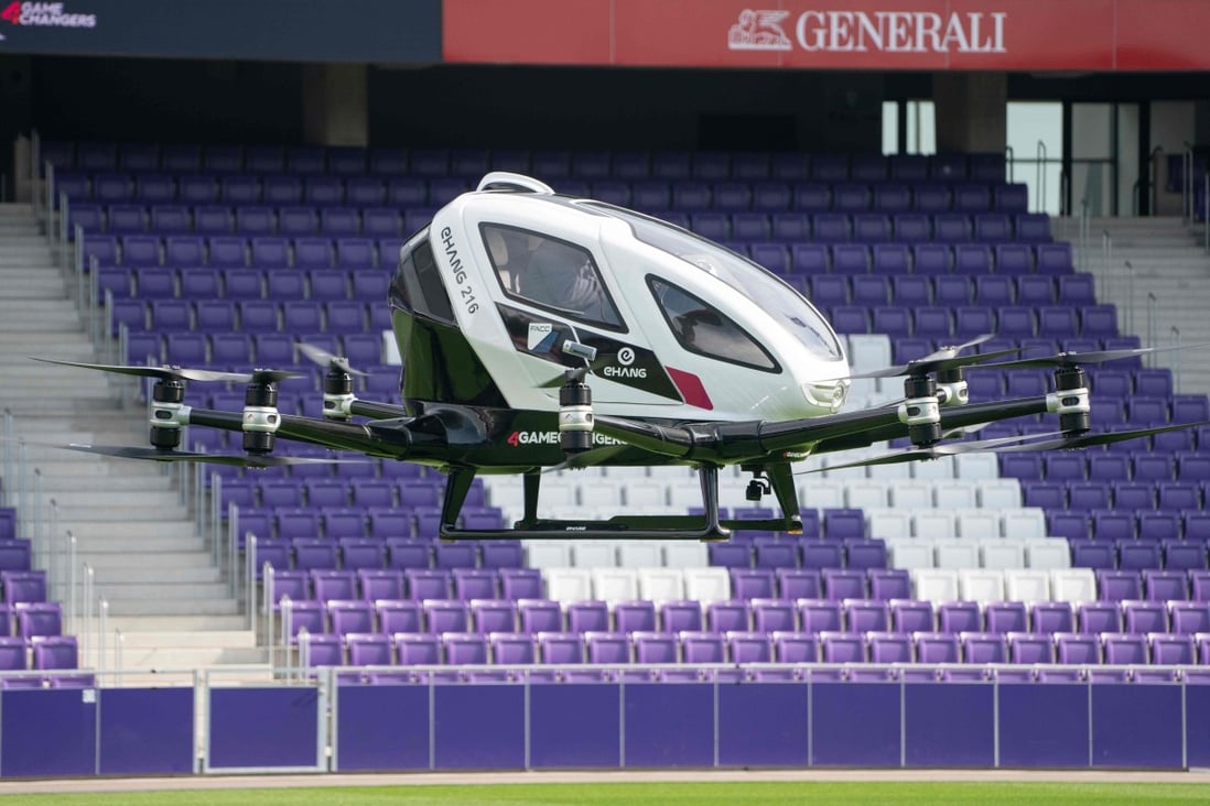 The two-seater Ehang 216, an electric-powered autonomous flying taxi, takes a short flight during its launch in April this year at Generali Arena in Vienna, Austria. Photo: Agence France-Presse