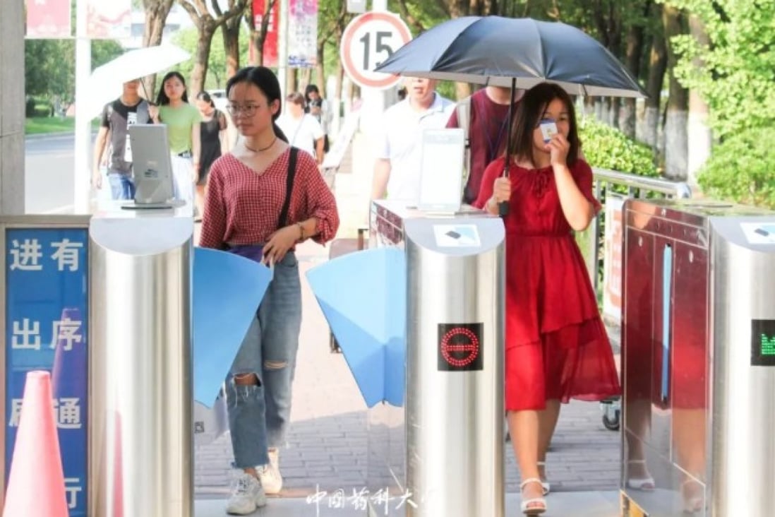 Students pass through a facial recognition turnstile at China Pharmaceutical University in Nanjing. Photo: Weibo