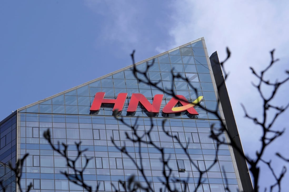 HNA Group’s logo on the building of HNA Plaza in Beijing on February 9, 2018. Photo: Reuters