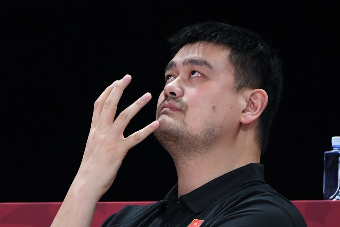 Yao Ming can’t hide his disappointment after his team lost to Venezuela at the Basketball World Cup. Photo: EPA