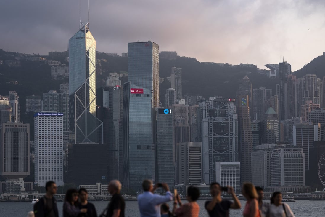 The downgrade will have implications for the borrowing costs of companies and the government in Hong Kong. Photo: Bloomberg
