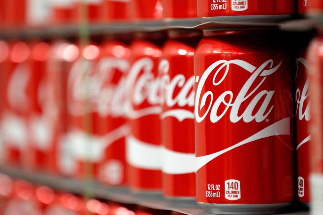 Coca-Cola offers easy calories to a trail runner desperate to replenish dwindling energy, but what is it doing to their oral hygiene? Photo: AFP