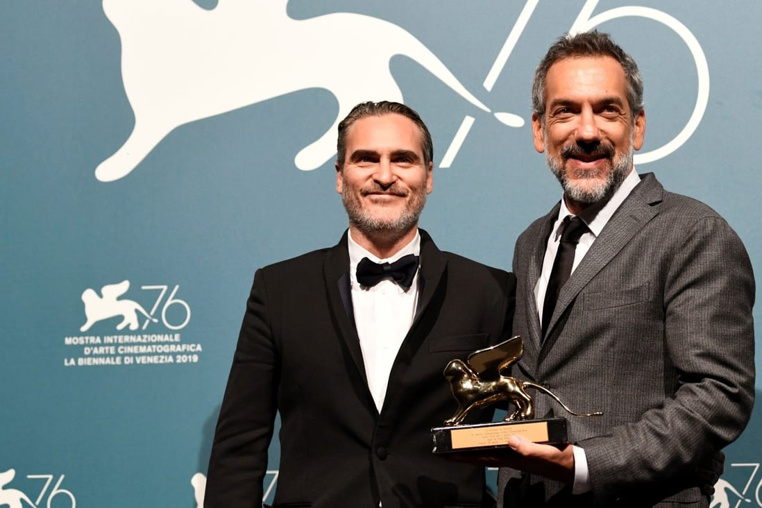 Director Todd Phillips (right) and Joaquin Phoenix with the Golden Lion for Best Film at the 76th Venice Film Festival. Photo: Reuters