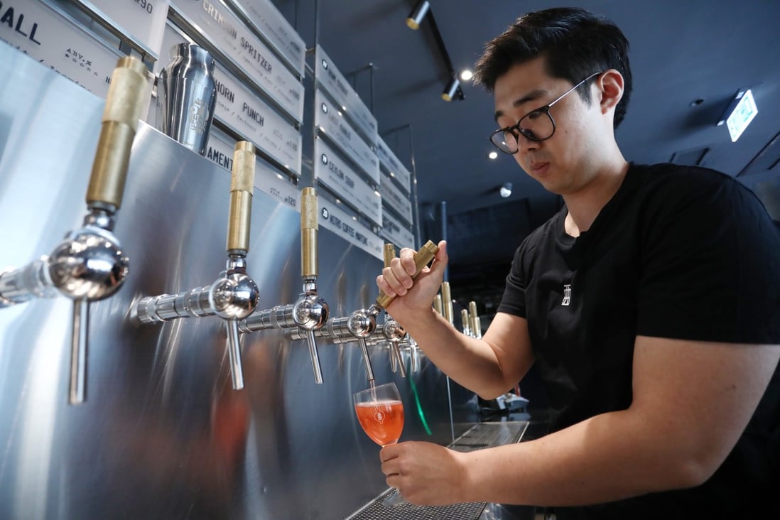 Alexander Ko, bar manager at Draft Land in Central. Draft Land serves pre-made cocktails on tap, and a nexus of different practices makes it one of the more eco-conscious bars in the city. Photo: Jonathan Wong