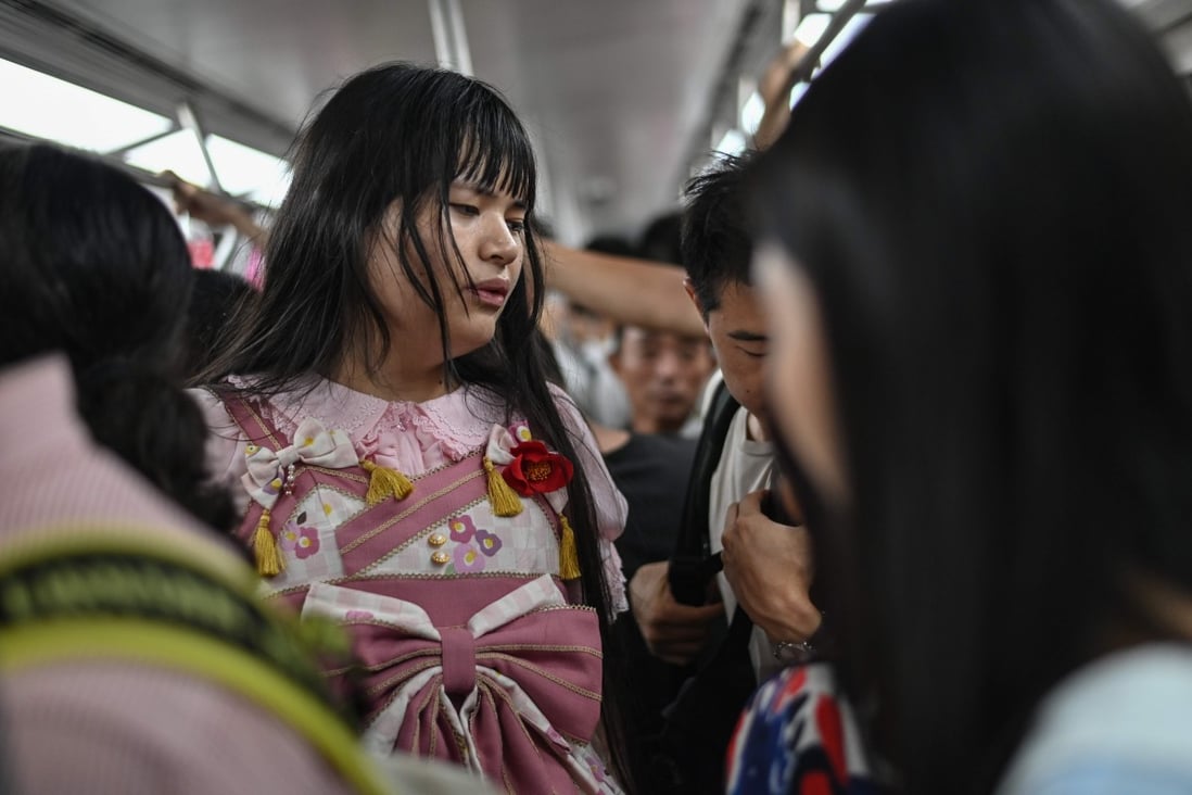 Alice (centre), a 23-year-old trans person, riding an underground train in the city of Chengdu in China’s Sichuan province. Photo: AFP
