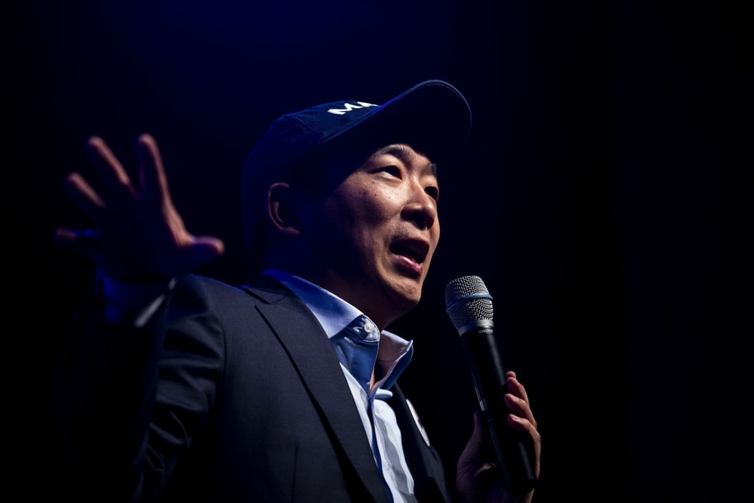 Democratic presidential candidate Andrew Yang answers questions from the audience during a town hall in Des Moines, Iowa, in April. Photo: The Des Moines Register via AP