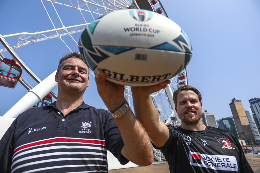 Hong Kong Rugby Union chief executive officer Robbie McRobbie and Hong Kong national team member Matthew Rosslee at the Hong Kong Observation Wheel in Central where the fanzone will take place. Photo: Tory Ho